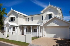 External Timber Cladding on a white home