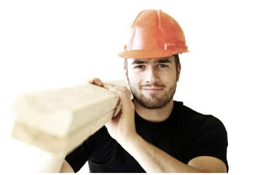 Builder with wooden planks