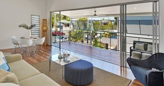 Beach house living room with Spotted Gum Engineered Flooring