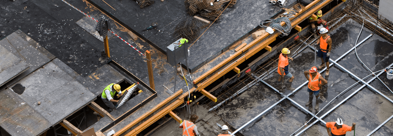 Construction site with builders